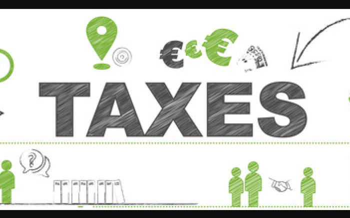 A graphic with the word "Taxes" in bold letters and several smaller icons around it. The icons are mainly people and finance-related.
